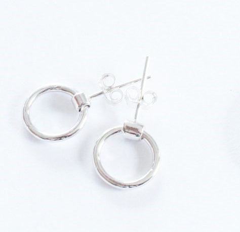 8mm in width and 1.5mm thick, these sterling silver earrings swing as you move, with tiny butterfly backs.