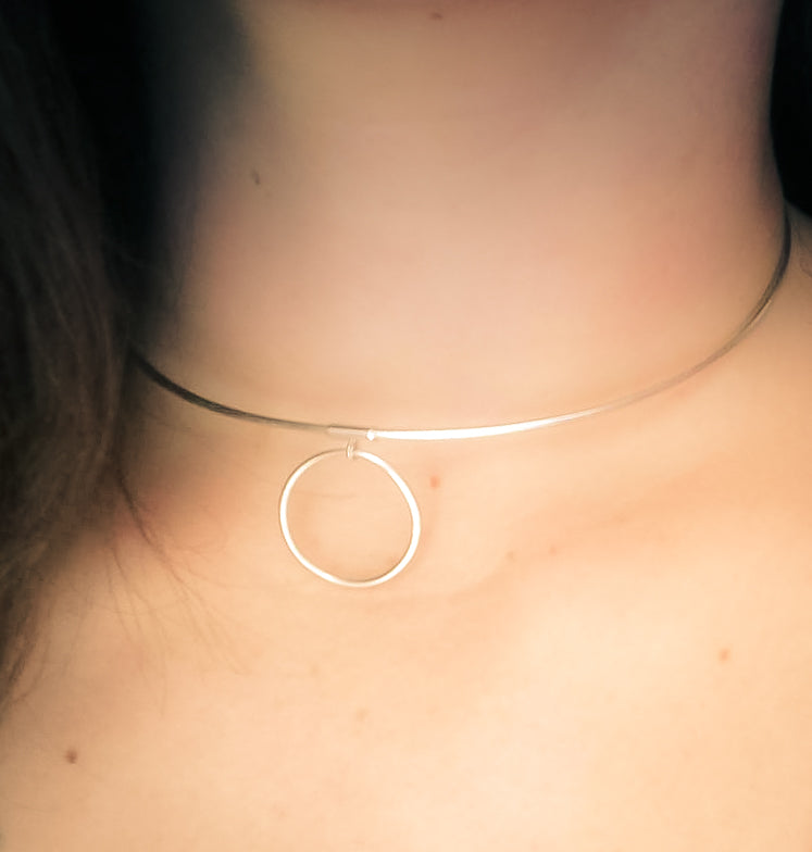 This Discreet Submissive Solid Sterling Silver (925) Day collar necklace is perfect for those that want to make a statement, or be discreet. The collar compliments both casual and formal wear, making it an excellent choice for a day/evening collar. The inside diameter of the sterling silver O ring is just over 25 mm and 1.5 mm thick, with a large 15 mm lobster style locking clasp to ensure you are comfortable at all times!