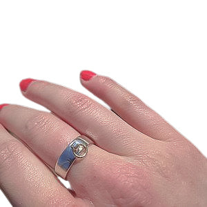 STORY OF O RING, Sterling Silver with a 9K Gold O ring. Handmade in your size.